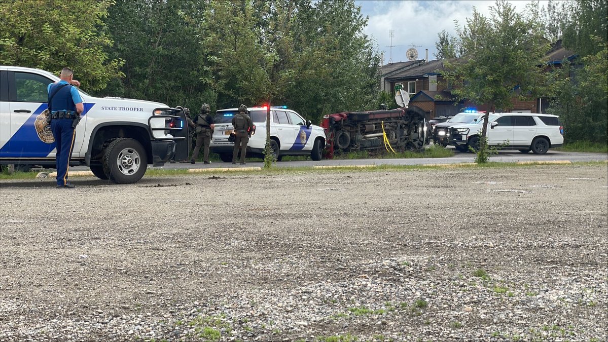 Vehicle on its side as SWAT responds to barricaded motorist in Fairbanks